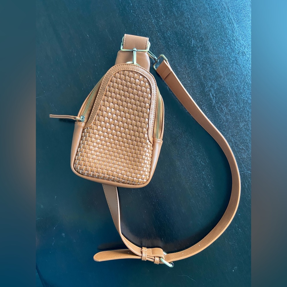 Woven liberty sling bag.